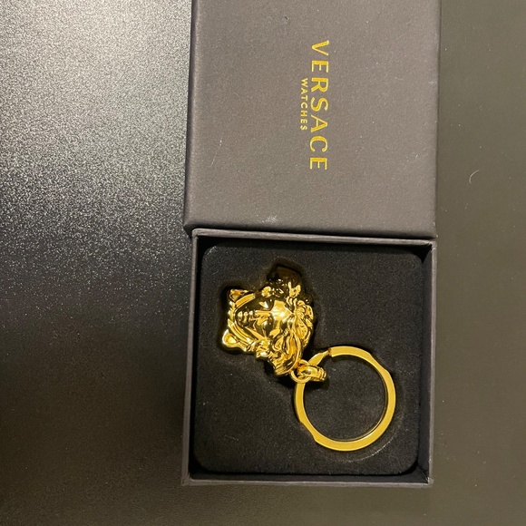 Versace purse, keychain, and socks - Picture 6 of 8